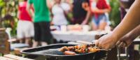 kebabs on grill; Group of people at cookout bbq /barbeque party at home, cooking grilled meat beef veg for bbq, happy friends party lifestyle